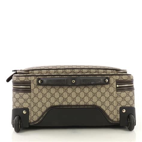 gucci roller luggage.